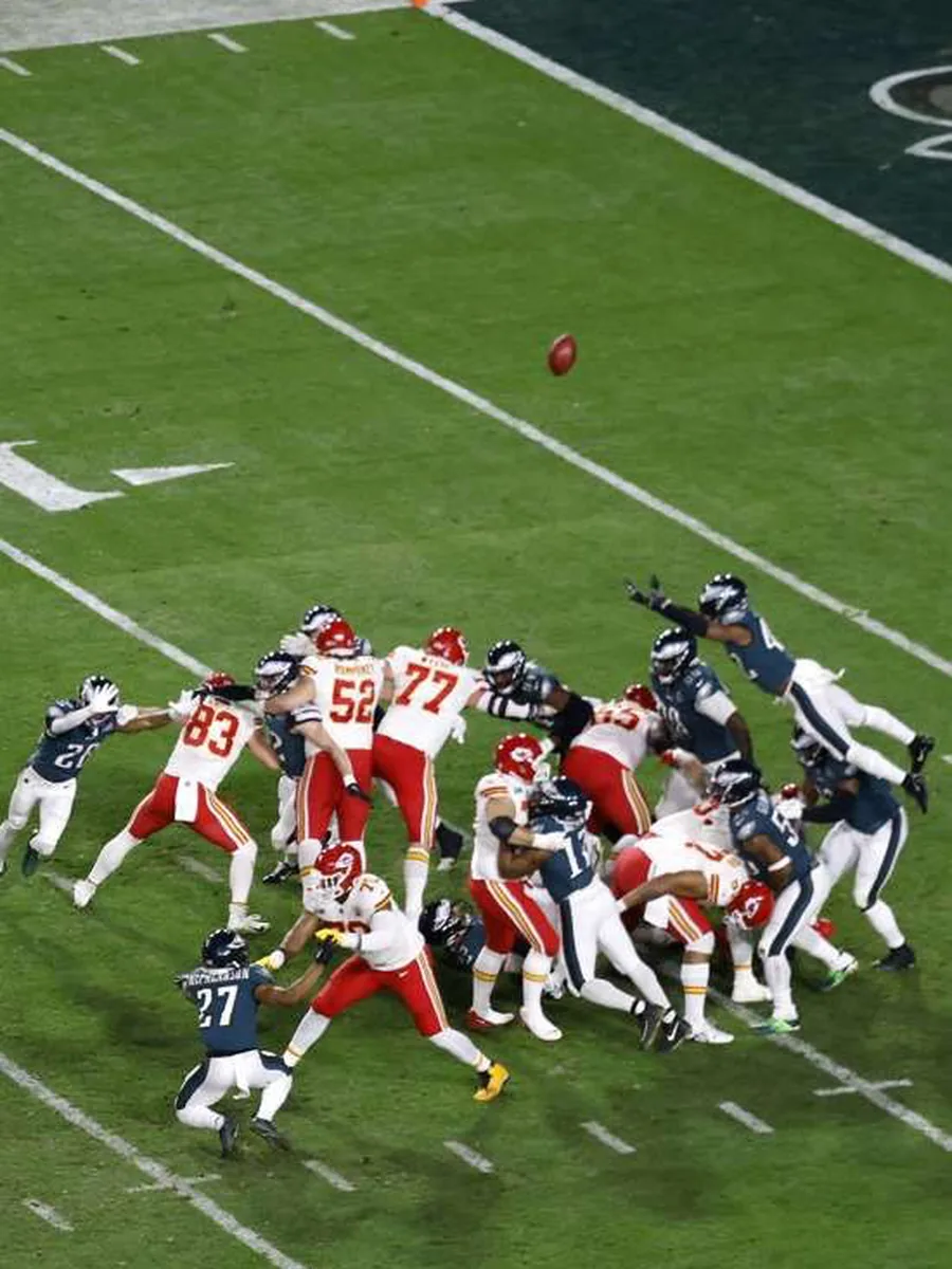 Jugada de un partido de fútbol americano